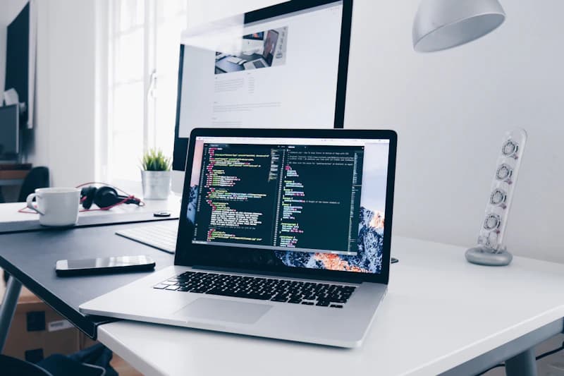 A developer working with a laptop