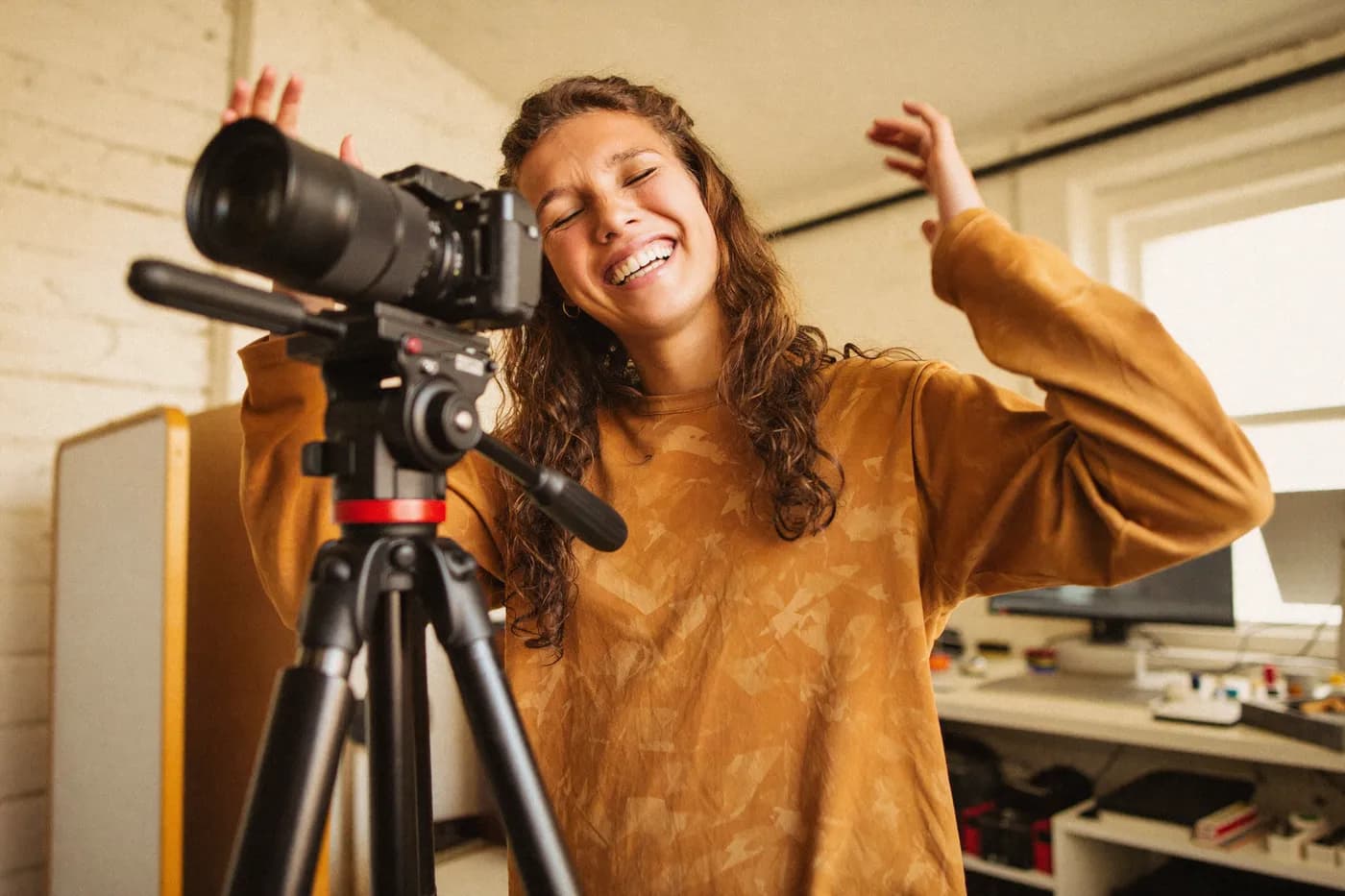 Presenter recording to camera on a studio set